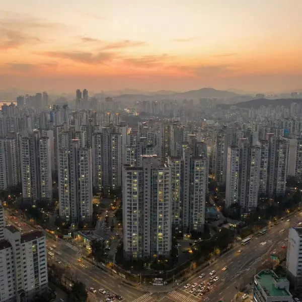 High-rise apartment complex in Seoul at sunset symbolizing household debt